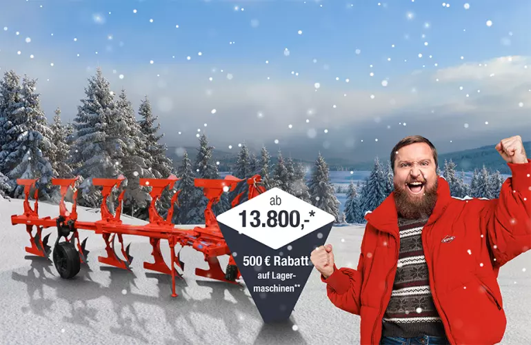 Eine Darstellung des Multi Master 113 4 T, welcher in der KUHL!-Winteraktion angeboten werden und Kuhnibert, ein bärtiger Mann in KUHN-Jacke, der sich darüber freut.